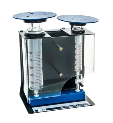 Hydraulic Press with Borosilicate Glass Cylinders.